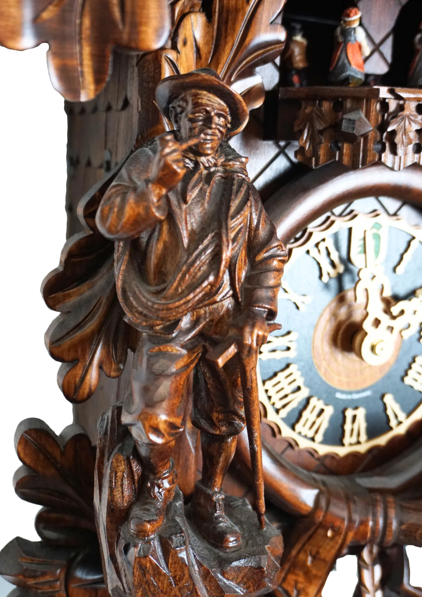 Cuckoo Clock  Majestic Eagle  8 Days Movement with Music (4) Precisely hand carved wildlife mechanical brown tradtional black forest clock, decorated with a majestic eagle, mountain goat and the rock climber. The clock plays music on the full hour and the dancers turn. This is one of the nicest tradtional cuckoo cl