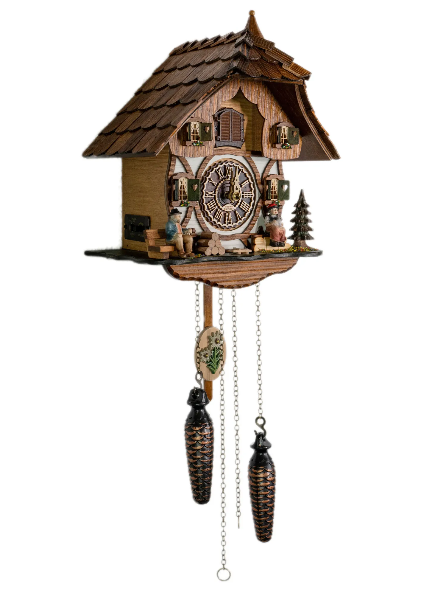 Cuckoo Clock  Black Forest Couple  Battery (2) Battery cuckoo clock with a black forest couple in front of the chalet house plays music made by Trenkle Uhren