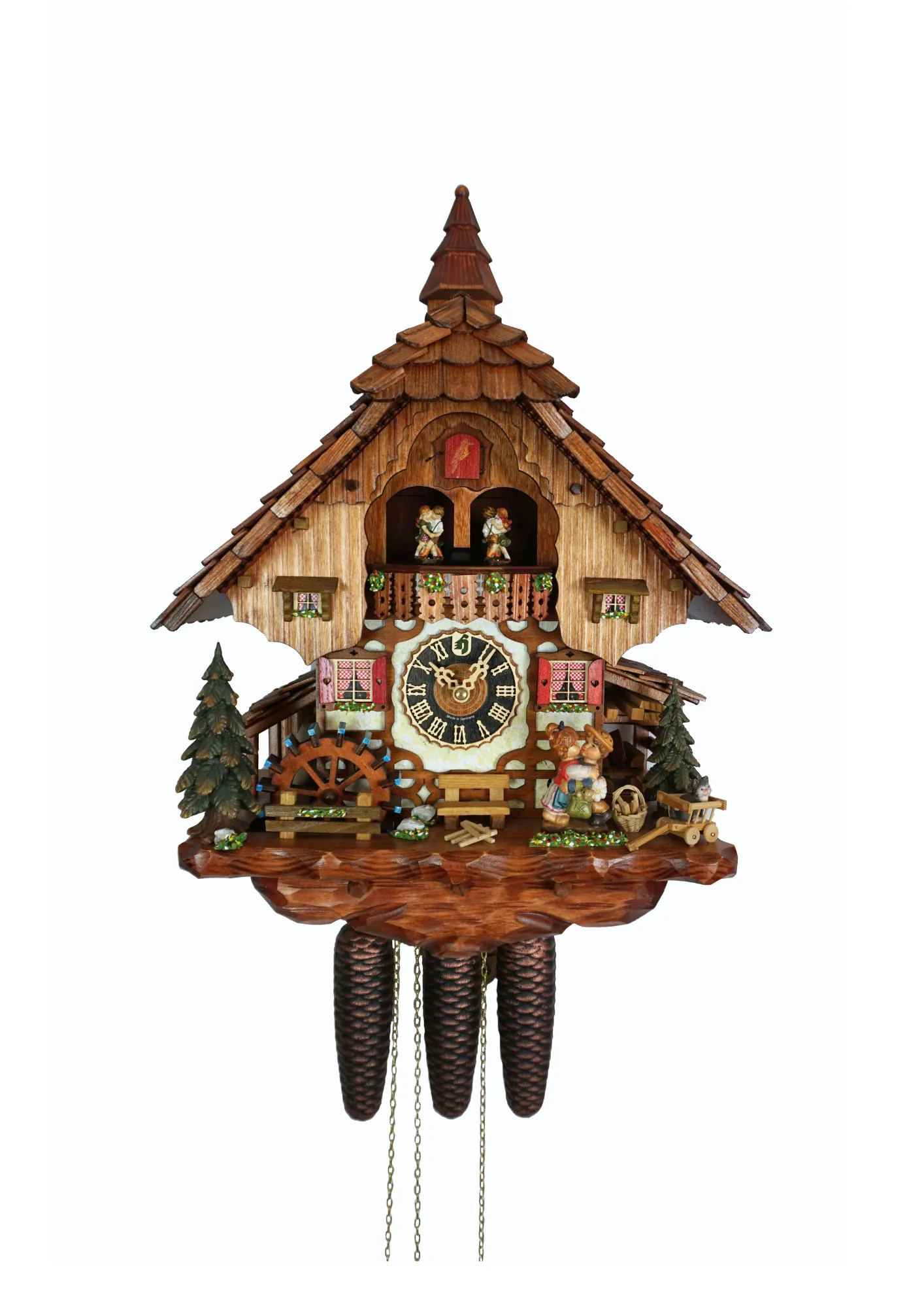Chalet shingle roof mechanical black forest cuckoo clock with presice attention to detail. The kids are turning their heads and kissing, water wheel turns and the dancers are dancing as the music is playing