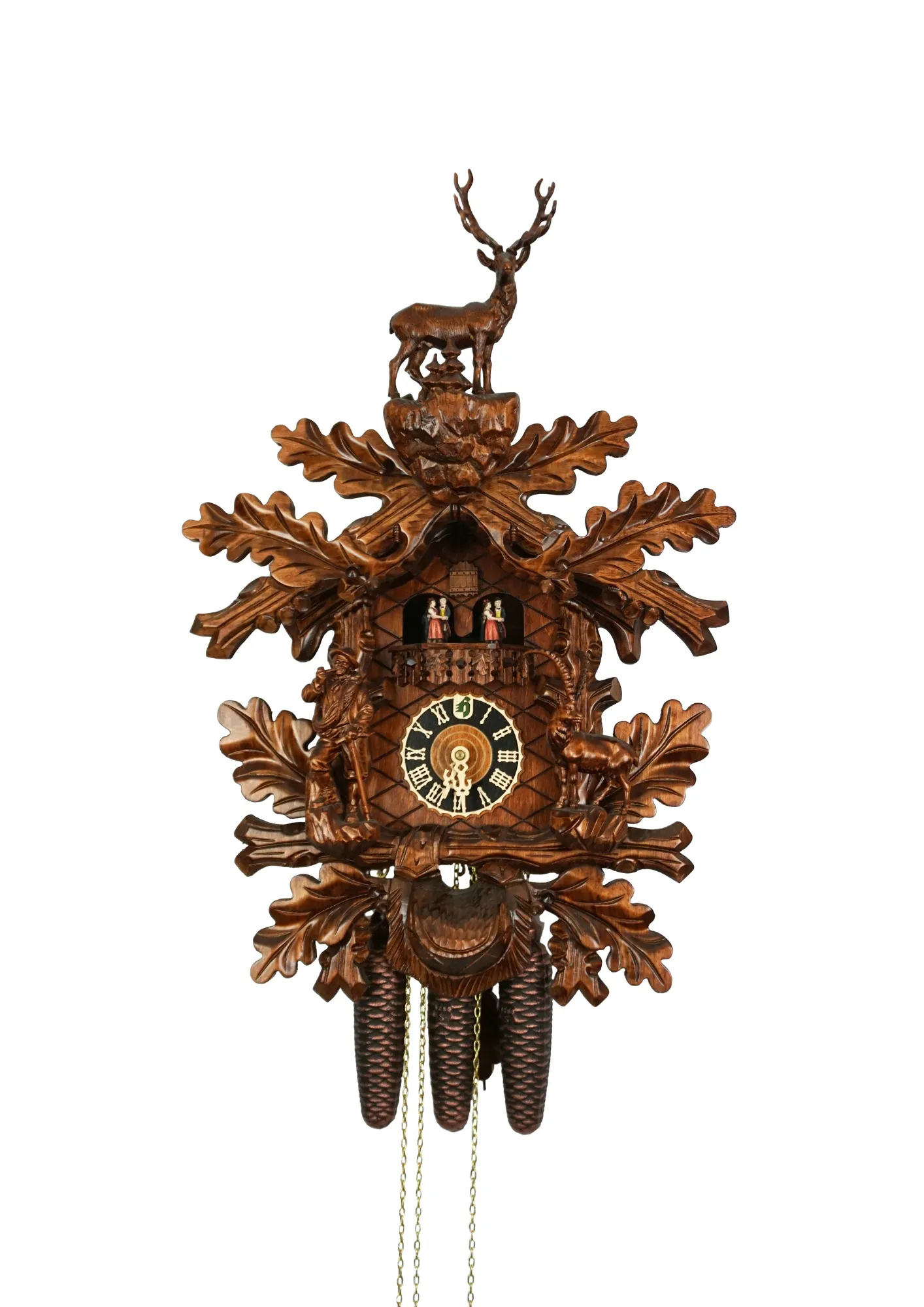 Large authentic traditional style brown mechanical black forest cuckoo clock precisely hand carved to the finest detail. Representing black forest wildlife with an oak leaves decorating the whole clock, deer overlooking the forest on top, ox and the rock 