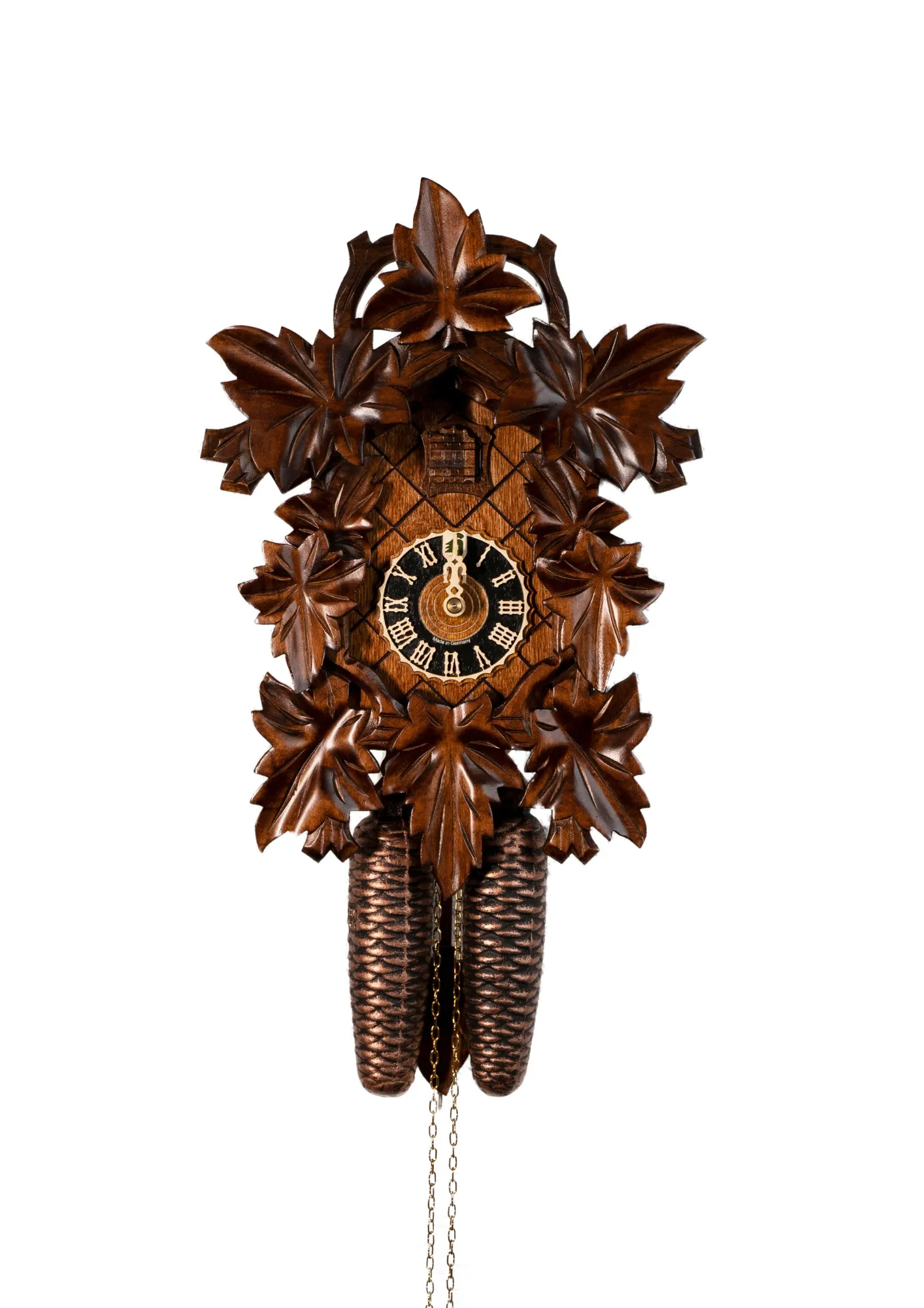 Middle sized traditional hand carved brown mechanical cuckoo clock decorated with wine leaves with 8 days mechanism, made by Hönes