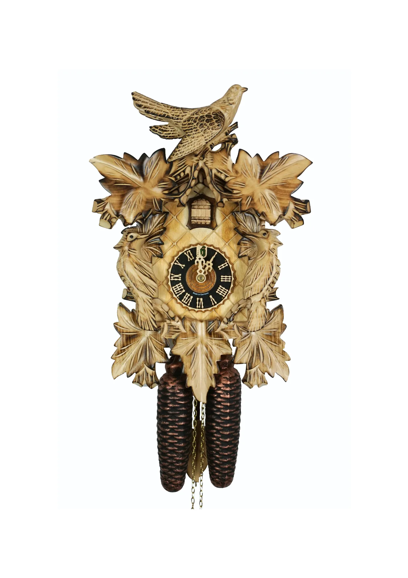 Middle sized traditional hand carved beige mechanical cuckoo clock decorated with wine leaves and with three birds with 8 days mechanism, the clock is preserved in its natural wood color, made by Hönes