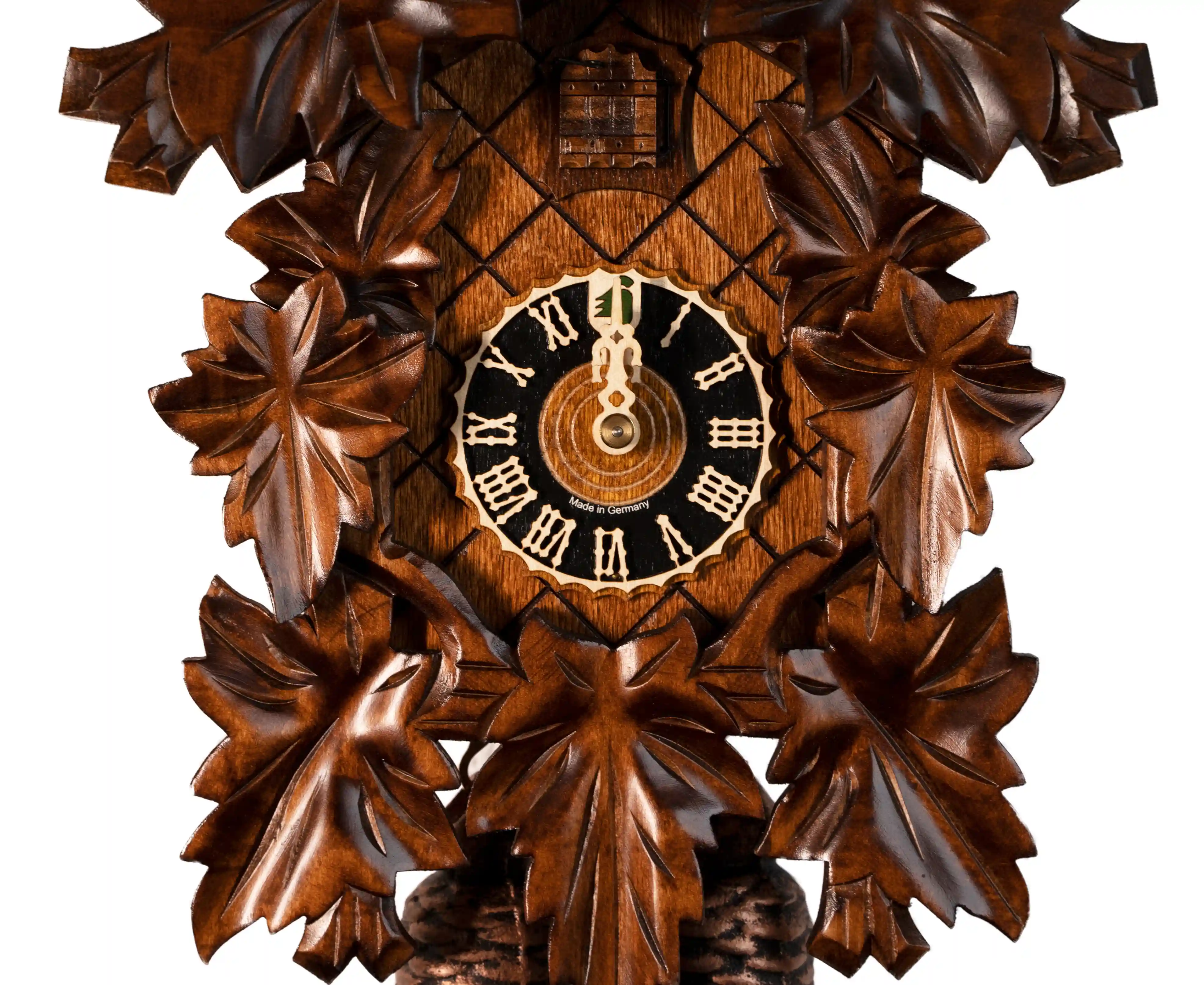 Cuckoo Clock  Wine Leaves  8 Days Movement (4) Middle sized traditional hand carved brown mechanical cuckoo clock decorated with wine leaves with 8 days mechanism, made by Hönes