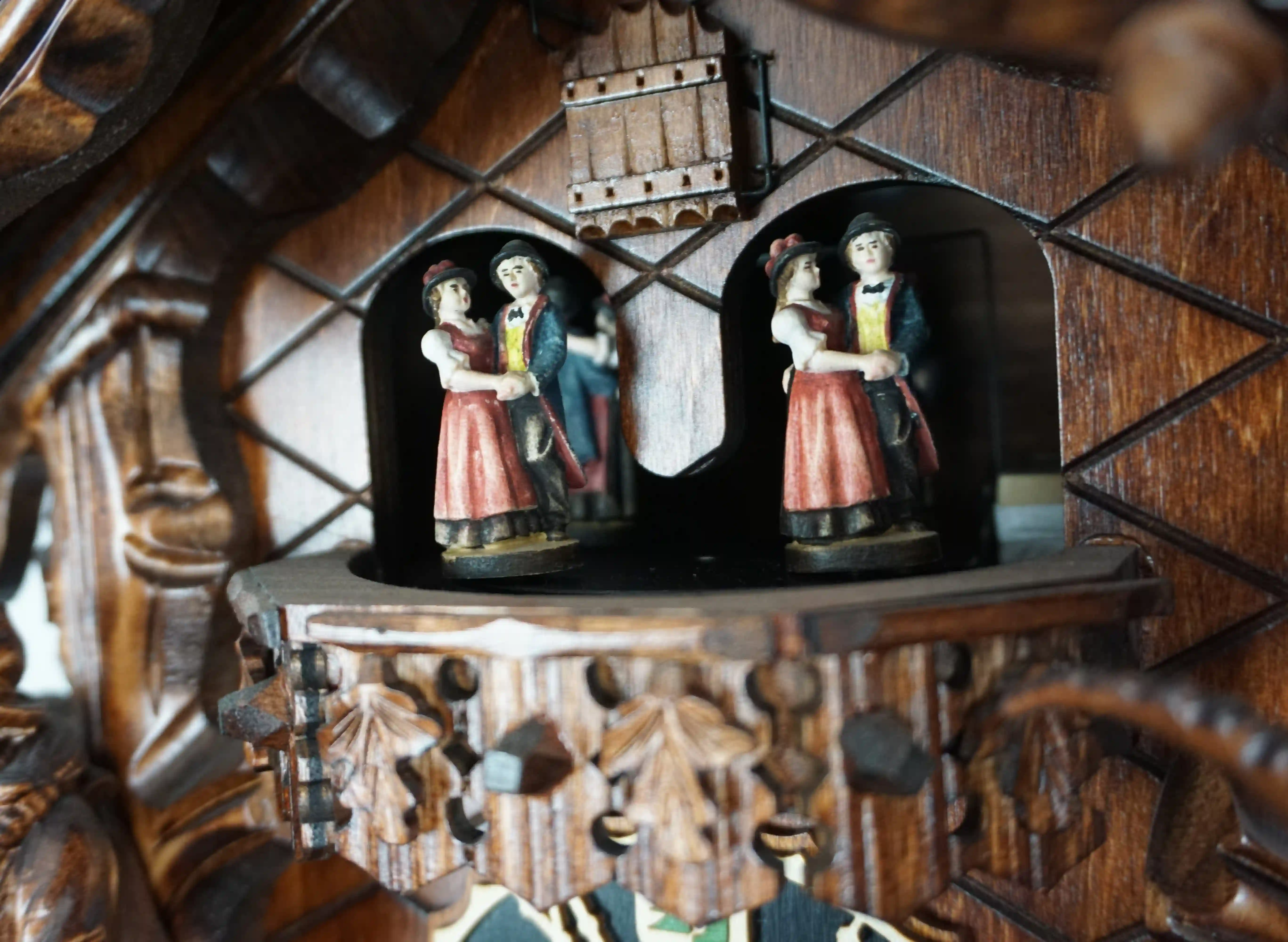 Cuckoo Clock  Black Forest Wildlife  8 Day Movement with Music (8) Large authentic traditional style brown mechanical black forest cuckoo clock precisely hand carved to the finest detail. Representing black forest wildlife with an oak leaves decorating the whole clock, deer overlooking the forest on top, ox and the rock