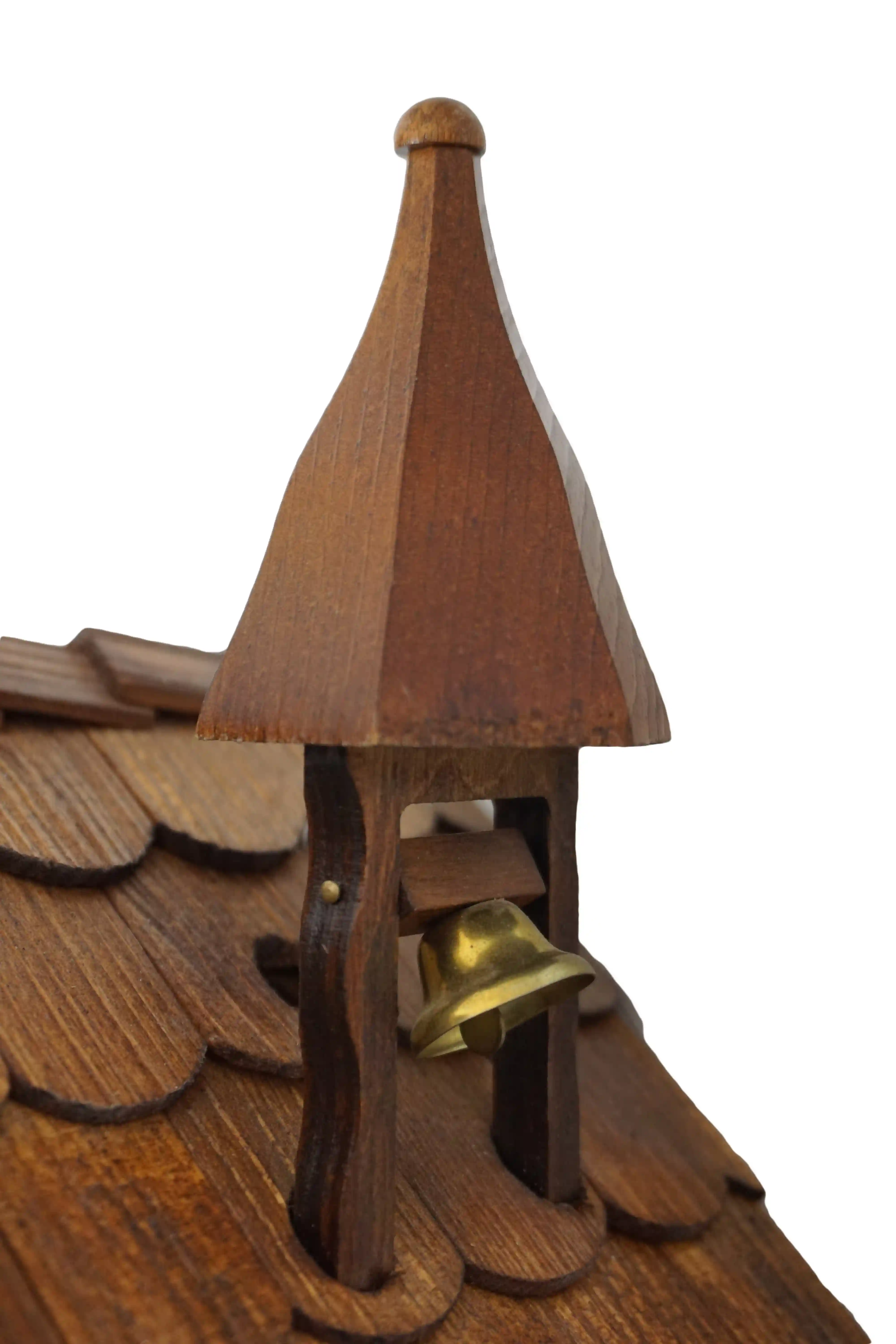 Cuckoo Clock  Bell Ringer  1 Day Movement  Music (7) Chalet style authentic mechanical black forest cuckoo clock with shingle roof, church tower bell and black forest lady wearing traditional clothing, the lady rings the bell together with the cuckoo sound, music plays dancers dance and water wheel turns