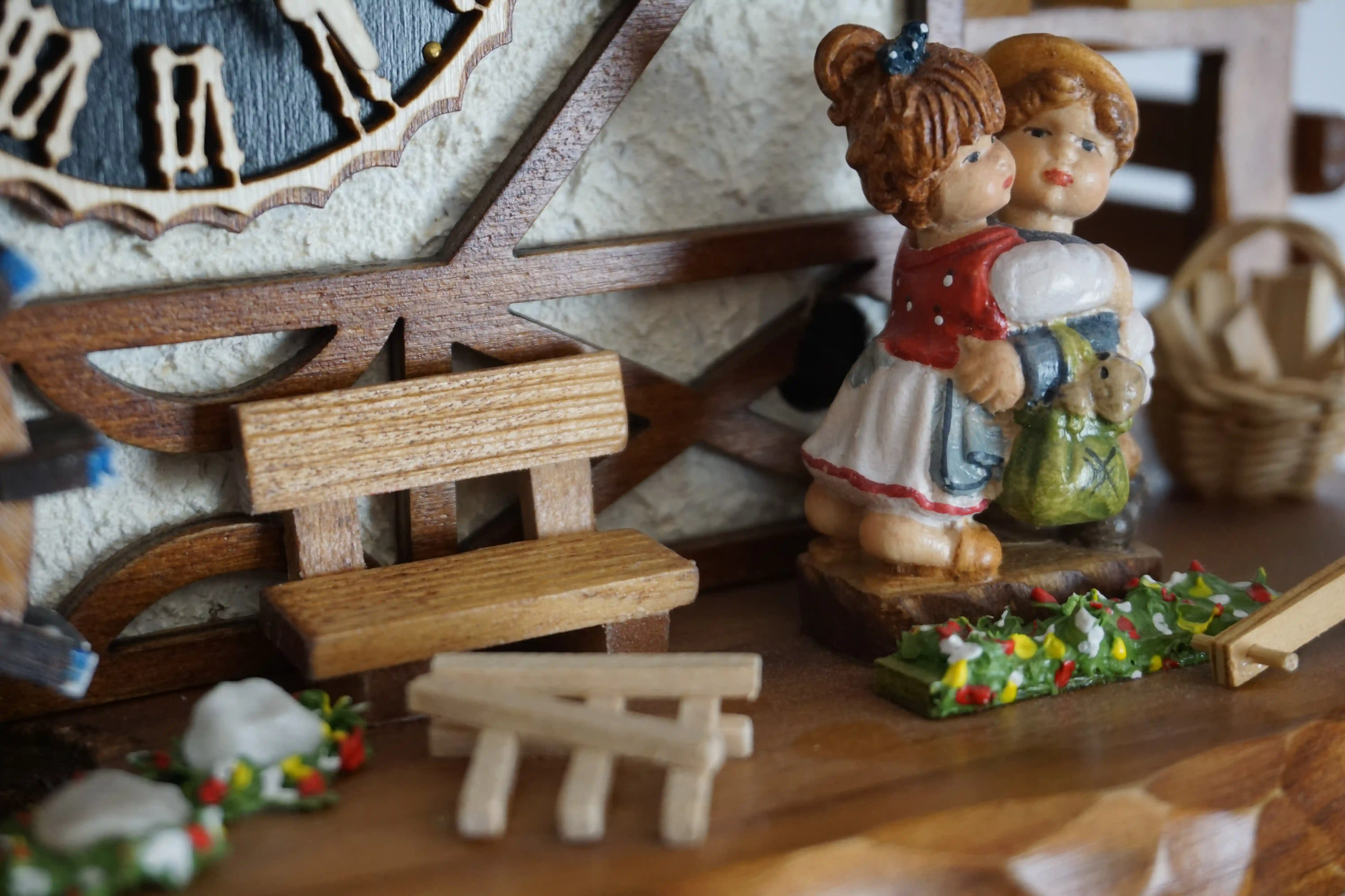 Cuckoo Clock  Kissing Kids with Music  1 Day Movement (5) Original black forest mechanical cuckoo clock carved to the finest detail, decorated with shingle roof, church tower bell, dancing and kissing kids and much more, plays music