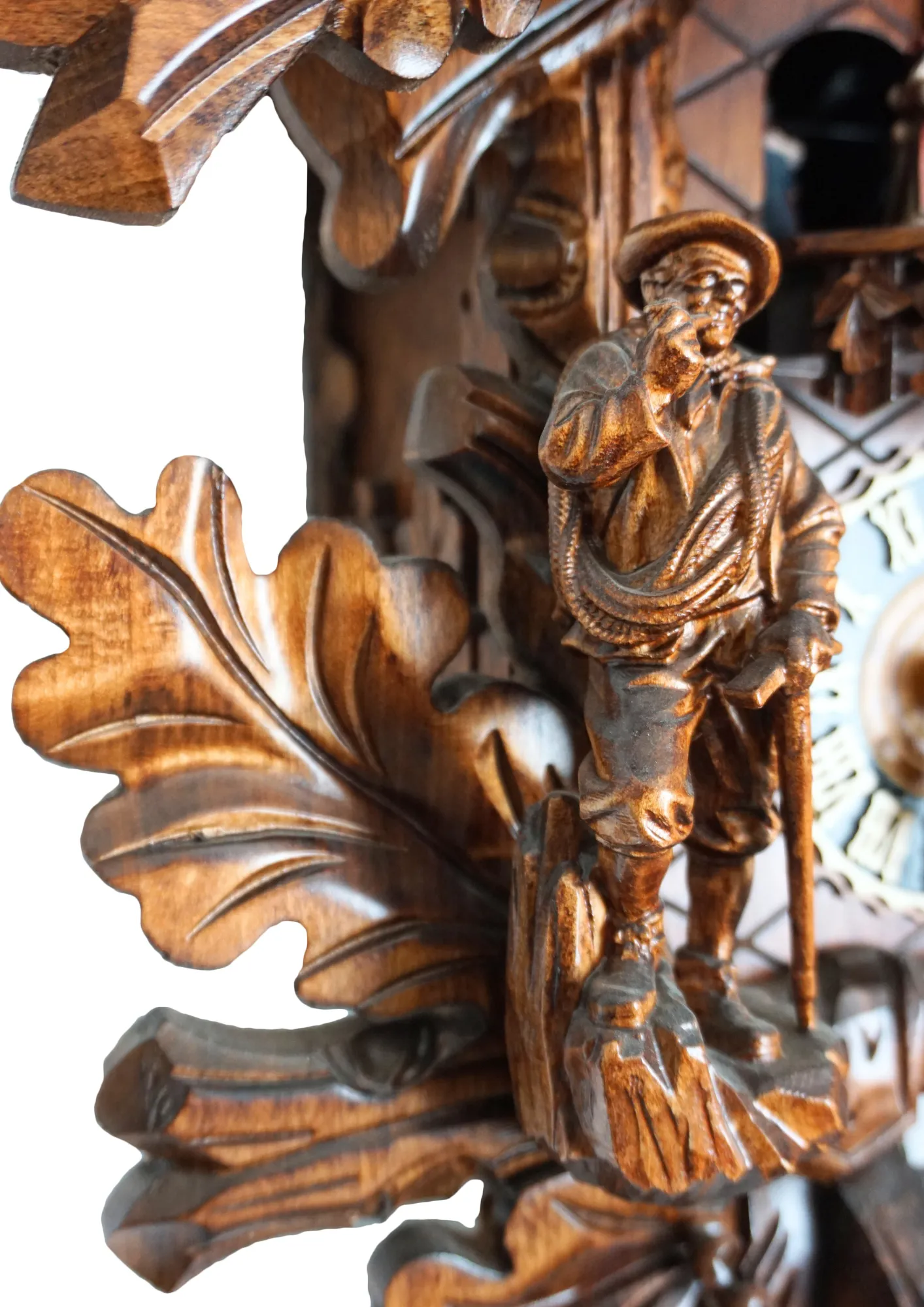 Cuckoo Clock  Black Forest Wildlife  8 Day Movement with Music (5) Large authentic traditional style brown mechanical black forest cuckoo clock precisely hand carved to the finest detail. Representing black forest wildlife with an oak leaves decorating the whole clock, deer overlooking the forest on top, ox and the rock