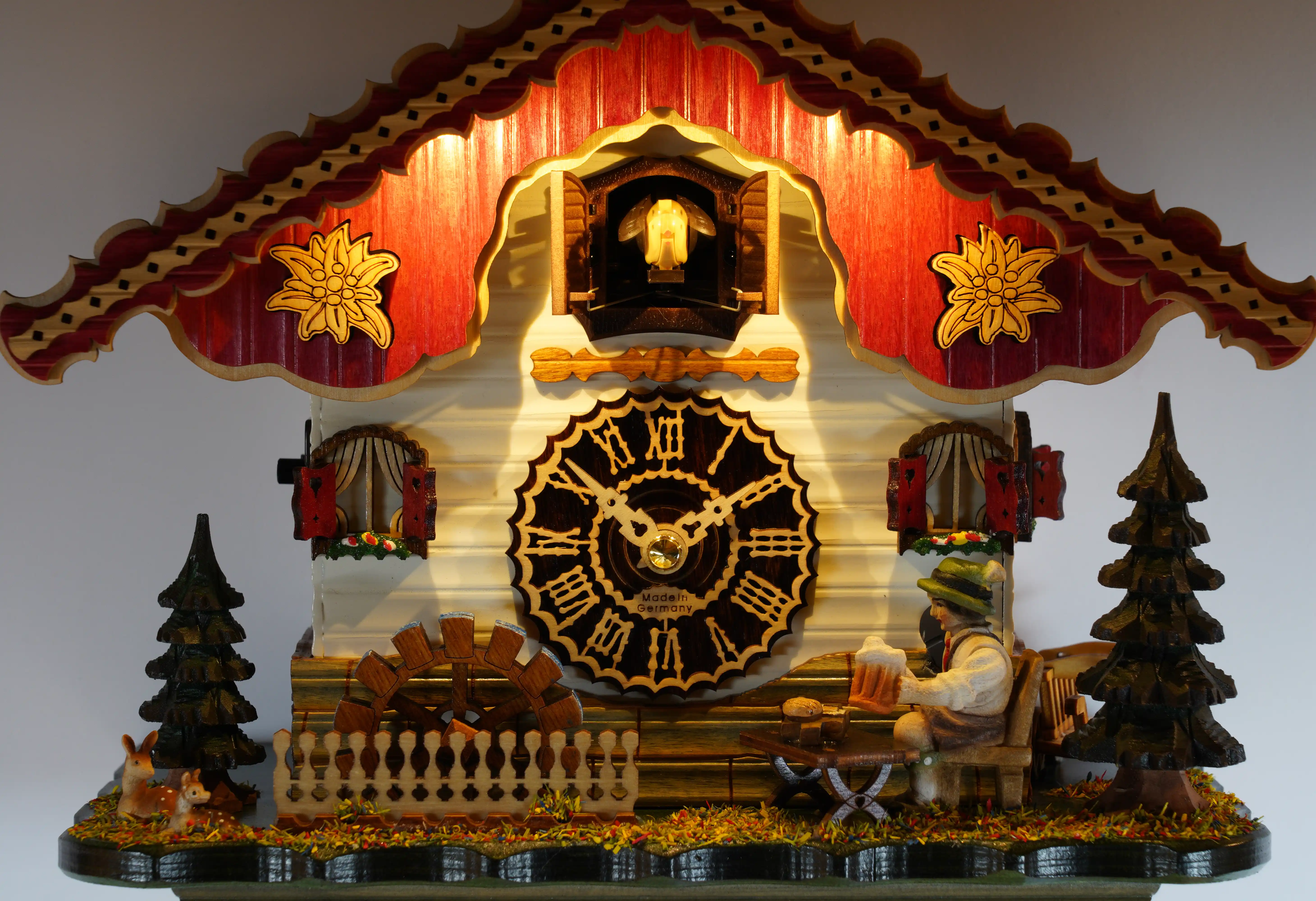 Cuckoo Clock  Beer Drinker  Cuckoo Shine Battery (2) Black Forest cuckoo clock with a beer drinker and LED lights plays music made by Trenkle Uhren