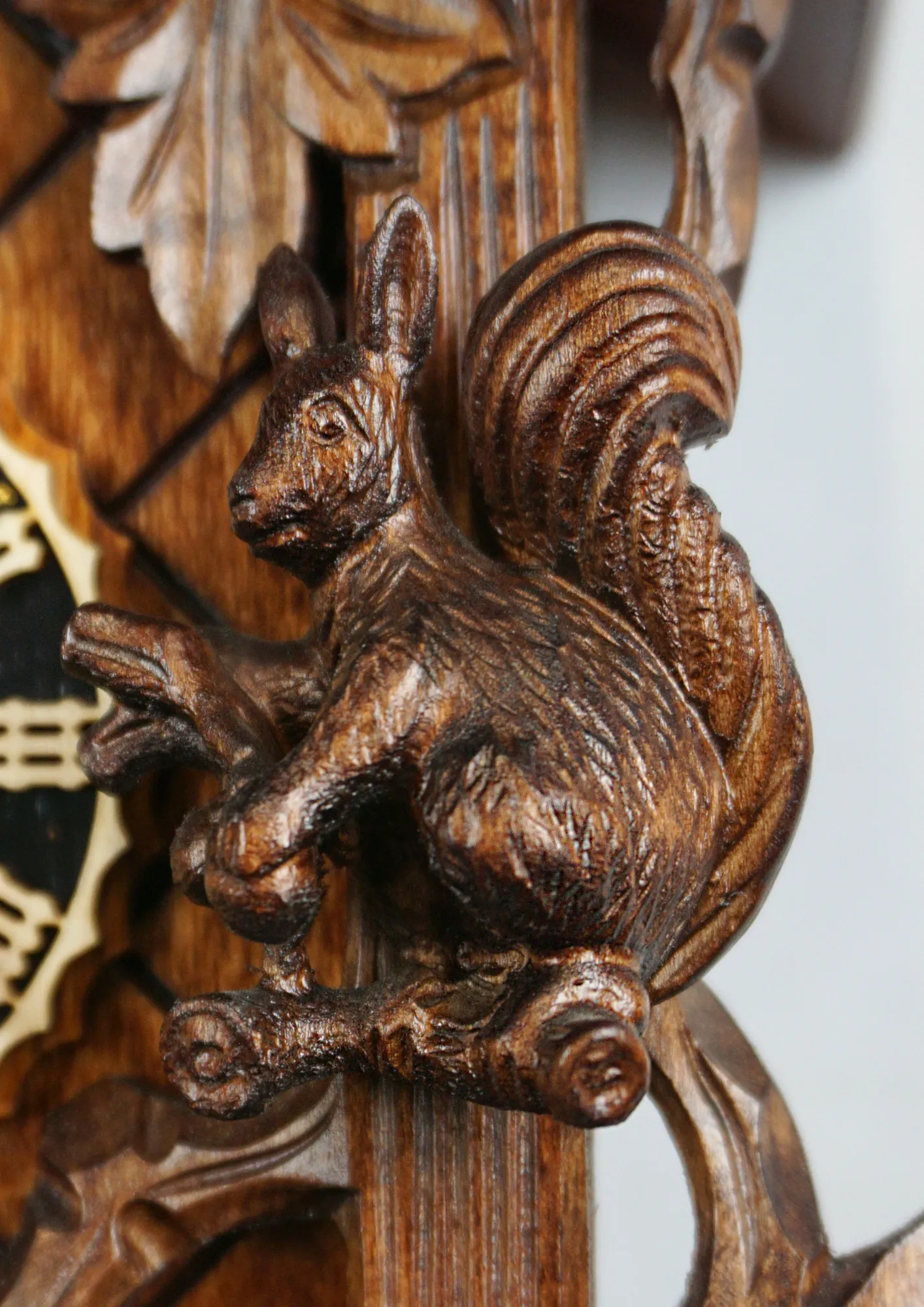 Cuckoo Clock  Wildlife  1 Day Movement (3) Hand carved traditional mechanical brown black forest cuckoo clock with squirrels and cuckoo bird carvings made by Hönes