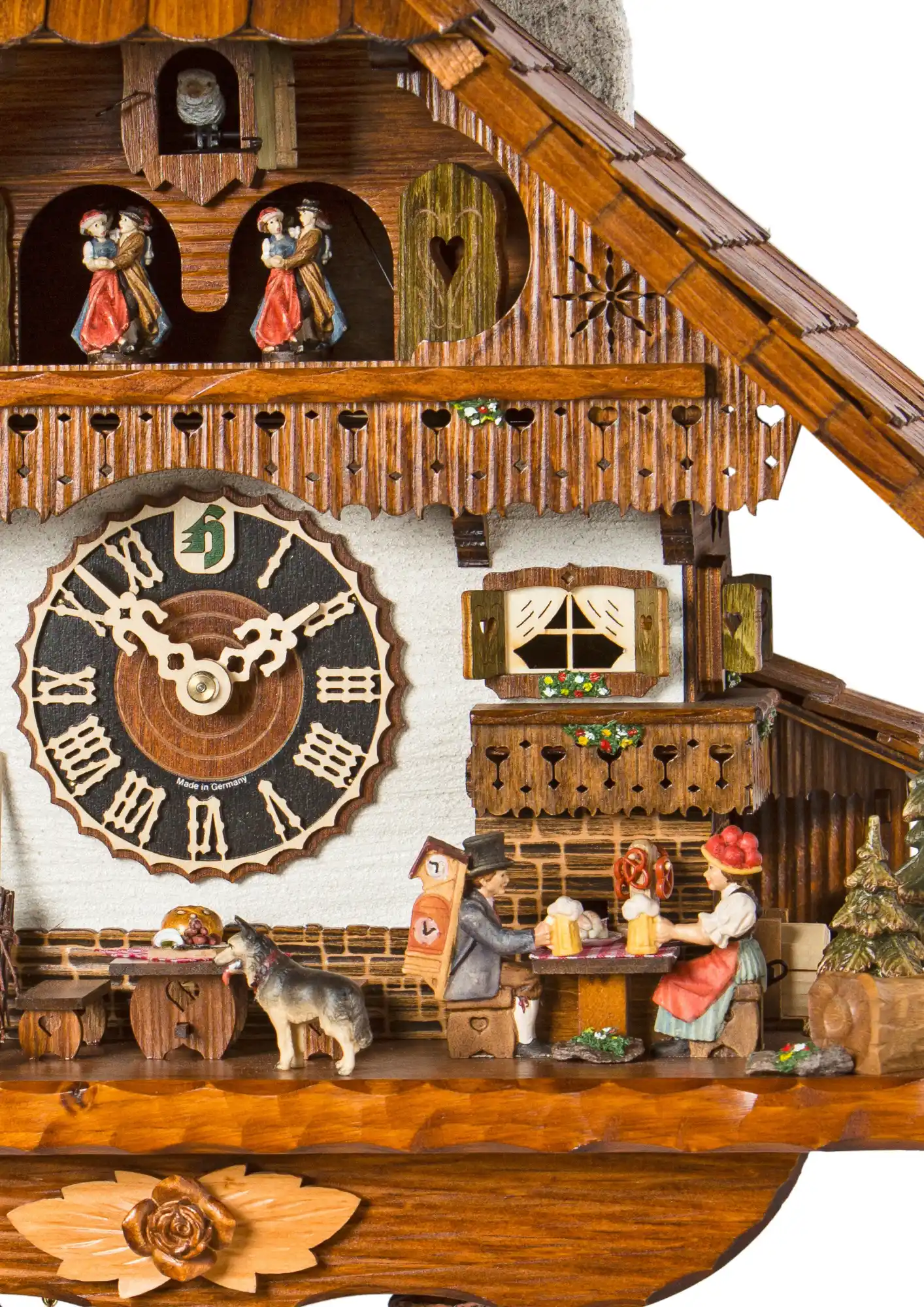 Cuckoo Clock  Zastler Cottage  8 Day Movement with Music (2) Large chalet mechanical colorful black forest cuckoo clock decorated to the finest detail with wonderer, clock salesman and young lady figures. The lady wears traditional Black Forest dress with red bollenhut which means she is single. Dancers dance, wate