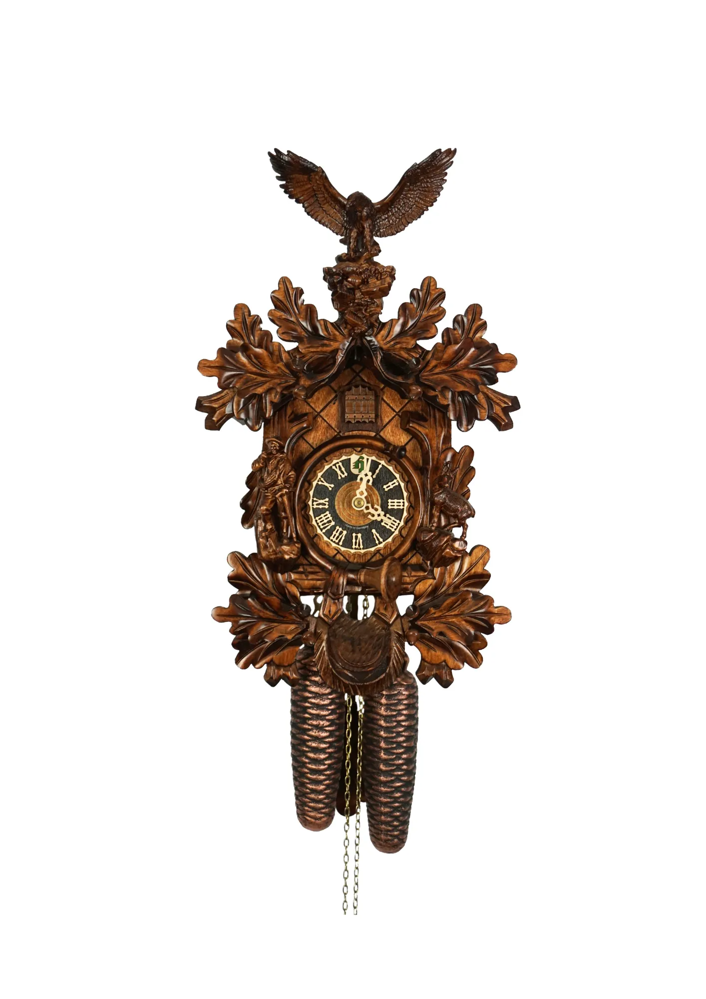Cuckoo Clock  Black Forest Wildlife  8 Day Movement (1) beautifully carved black forest brown mechanical cuckoo clock with an eagle on top of its crown, also decorated with a detailed figure of hunter and mountin goat. The dial is wraped with a hunting horn and beneath it hunting bag is hanging