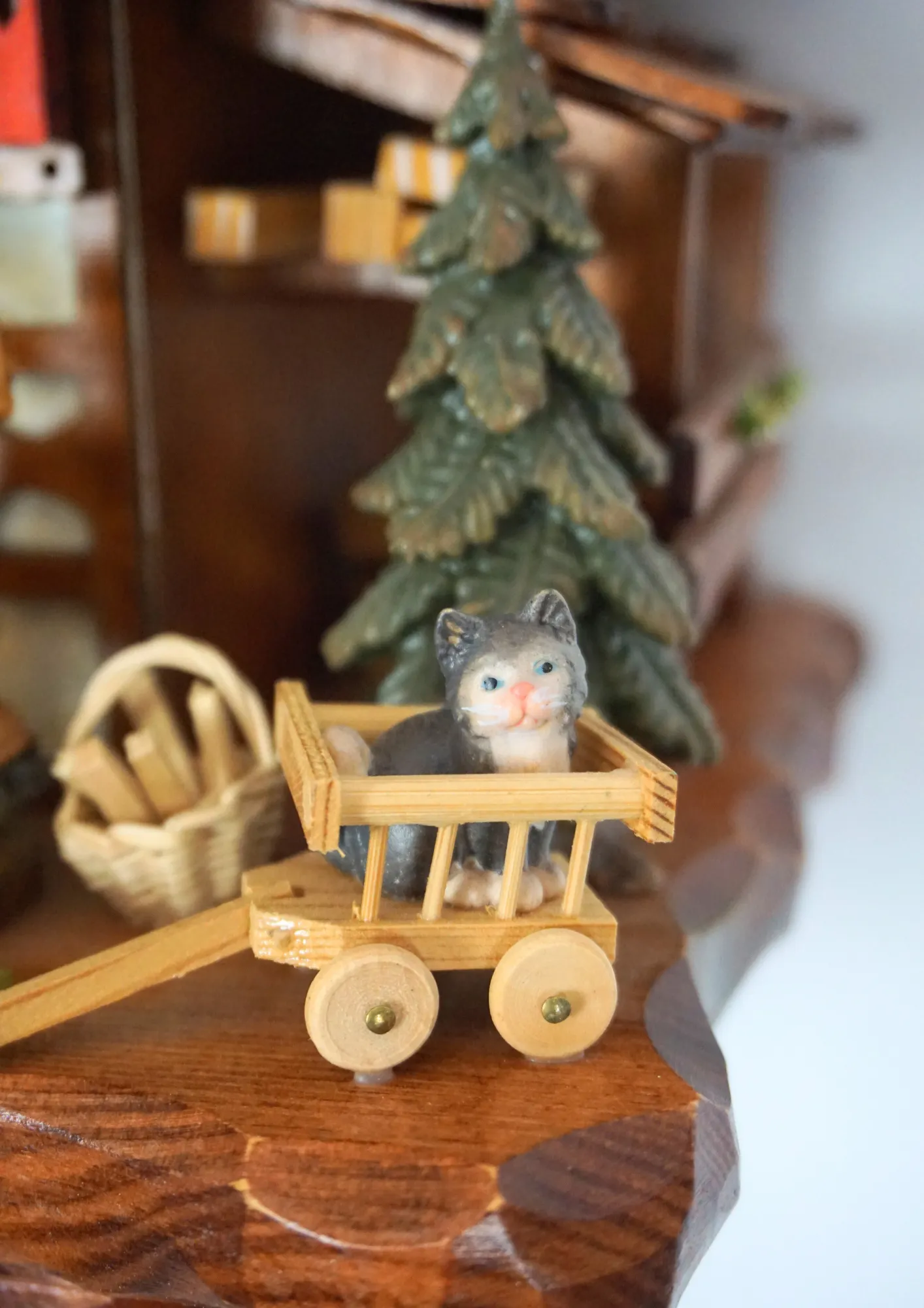 Cuckoo Clock  Kissing Kids  8 Day Movement with Music (4) Chalet shingle roof mechanical black forest cuckoo clock with presice attention to detail. The kids are turning their heads and kissing, water wheel turns and the dancers are dancing as the music is playing