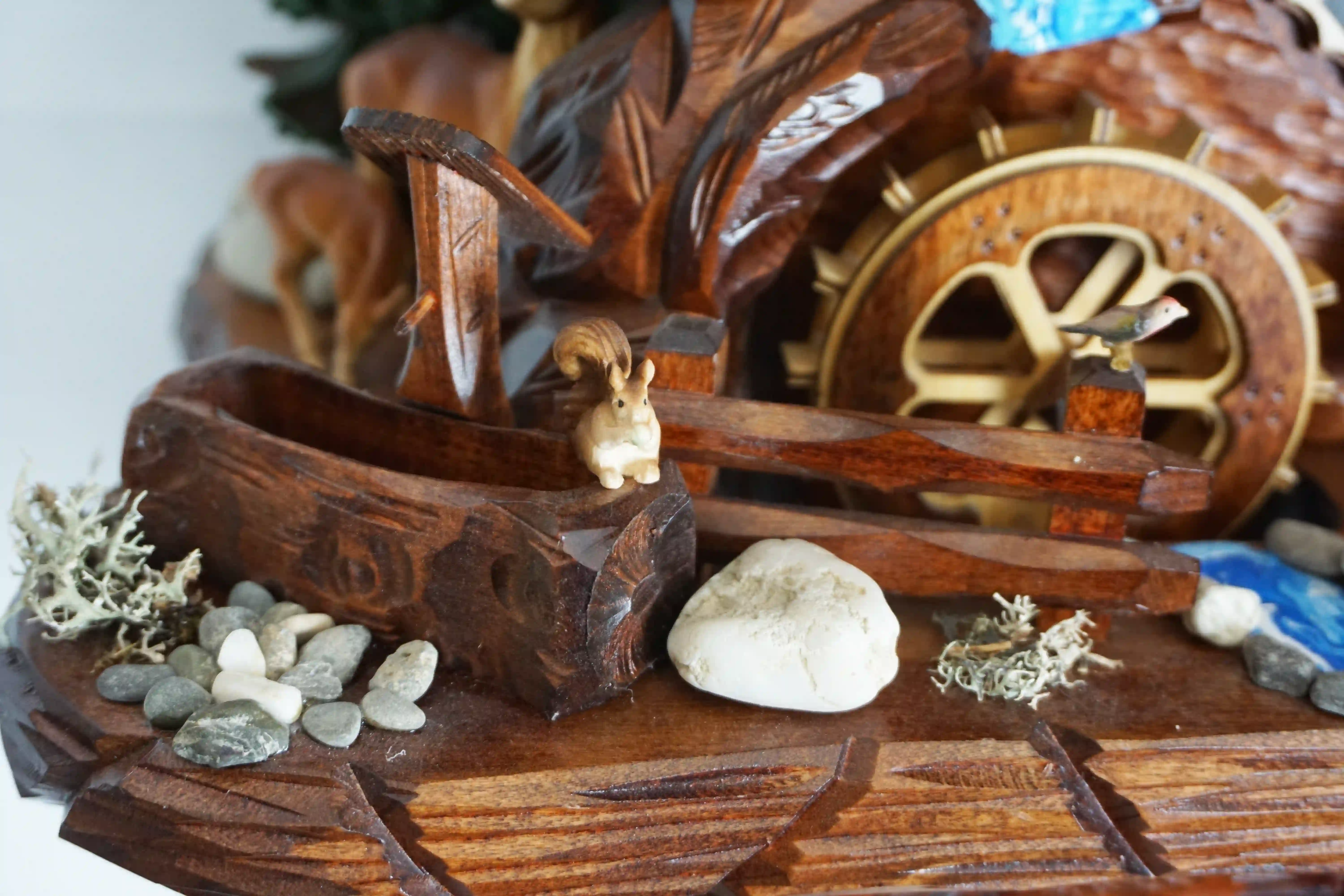 Cuckoo Clock  Brown Bears  8 Day Movement with Music (6) Massive hand carved mechanical 8 day brown cuckoo clock with absolute attention to detail. Clock is decorated with the black forest wildlife such as wood peckers, birds, squirels, deers and brown bears. Absolute stunning piece of art made by Hönes