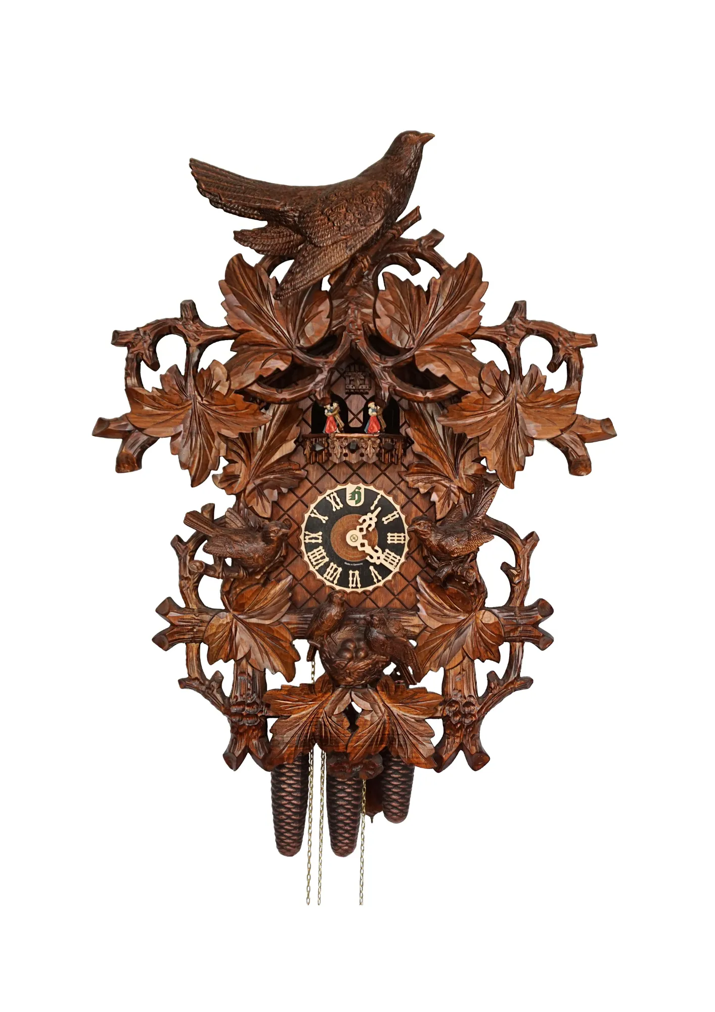Authentic lager mechanical 8 day brown traditional black forest cuckoo clock hand carved to the finest detail. Decorated with five bird carvings and their nest with the offspring, this clocks represents the brid nest and wildlife in Black Forest. Made by 