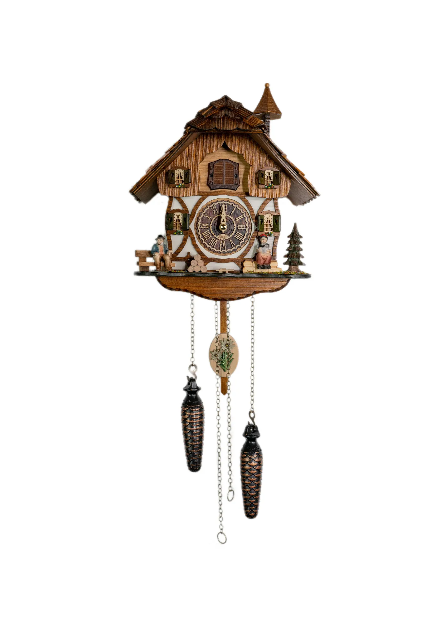 Cuckoo Clock  Black Forest Couple  Battery (1) Battery cuckoo clock with a black forest couple in front of the chalet house plays music made by Trenkle Uhren