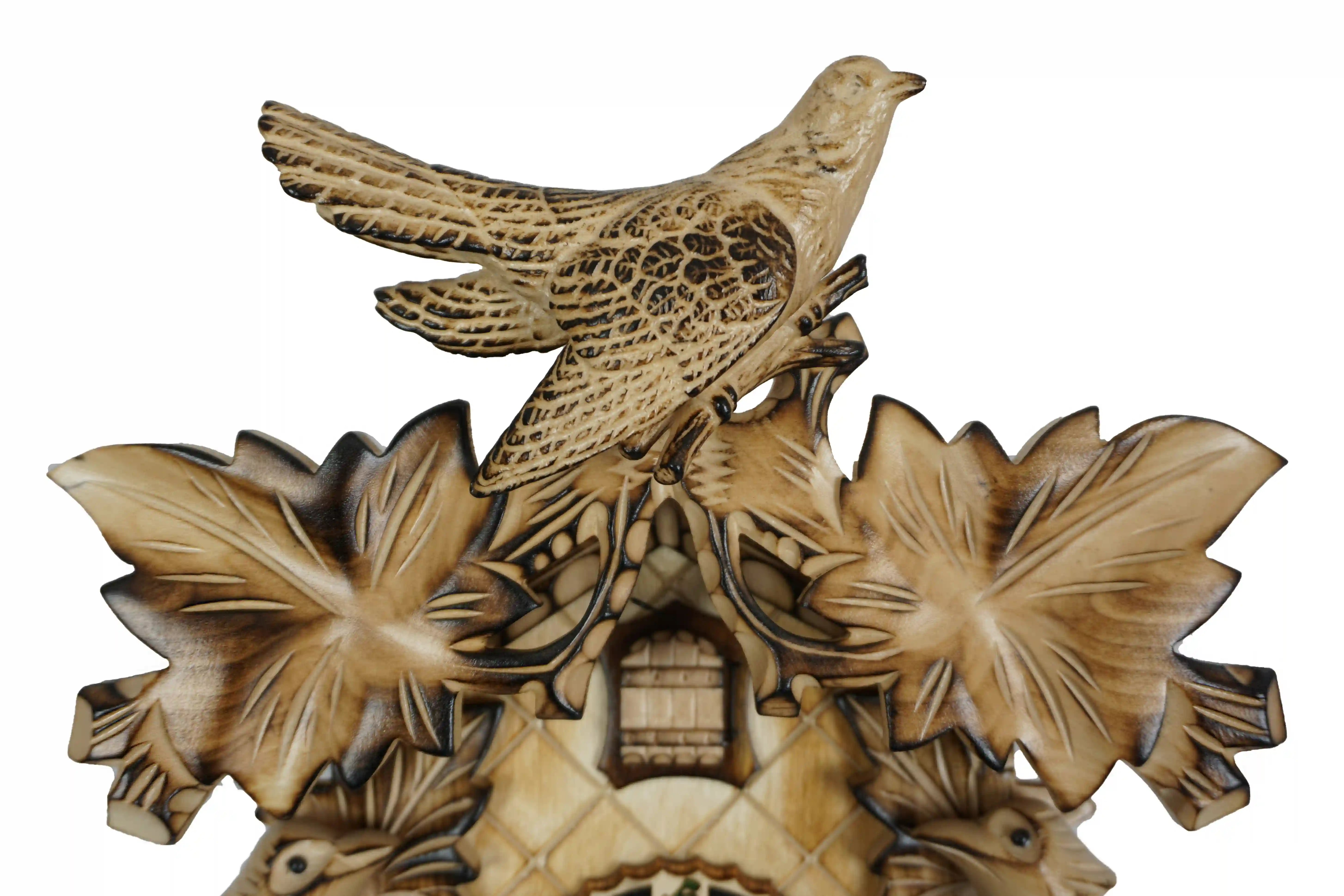 Cuckoo Clock  Natural Color Wood  8 Day Movement (5) Middle sized traditional hand carved beige mechanical cuckoo clock decorated with wine leaves and with three birds with 8 days mechanism, the clock is preserved in its natural wood color, made by Hönes