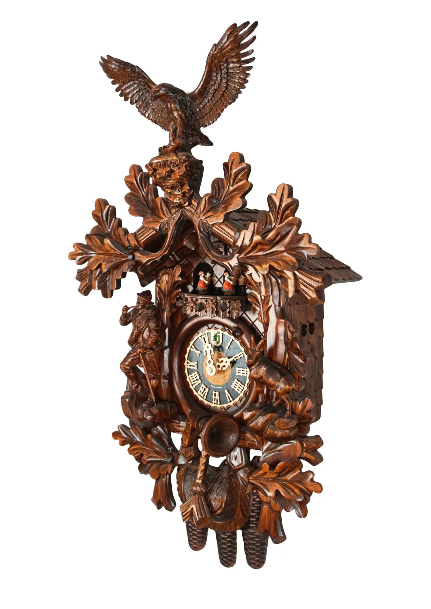 Cuckoo Clock  Majestic Eagle  8 Days Movement with Music (2) Precisely hand carved wildlife mechanical brown tradtional black forest clock, decorated with a majestic eagle, mountain goat and the rock climber. The clock plays music on the full hour and the dancers turn. This is one of the nicest tradtional cuckoo cl