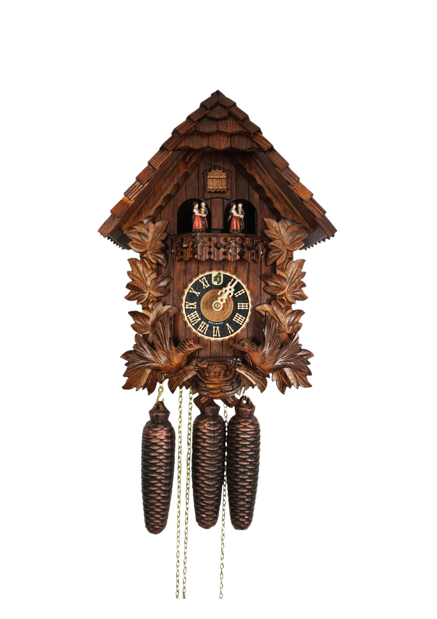 Large and carved mechanical 8 days black forest cuckoo clock with unusual design, while the frame is decorated in traditional style, the roof is covered in shingles. Two birds at the front are moving every time cuckoo comes out and feeding the offspring i