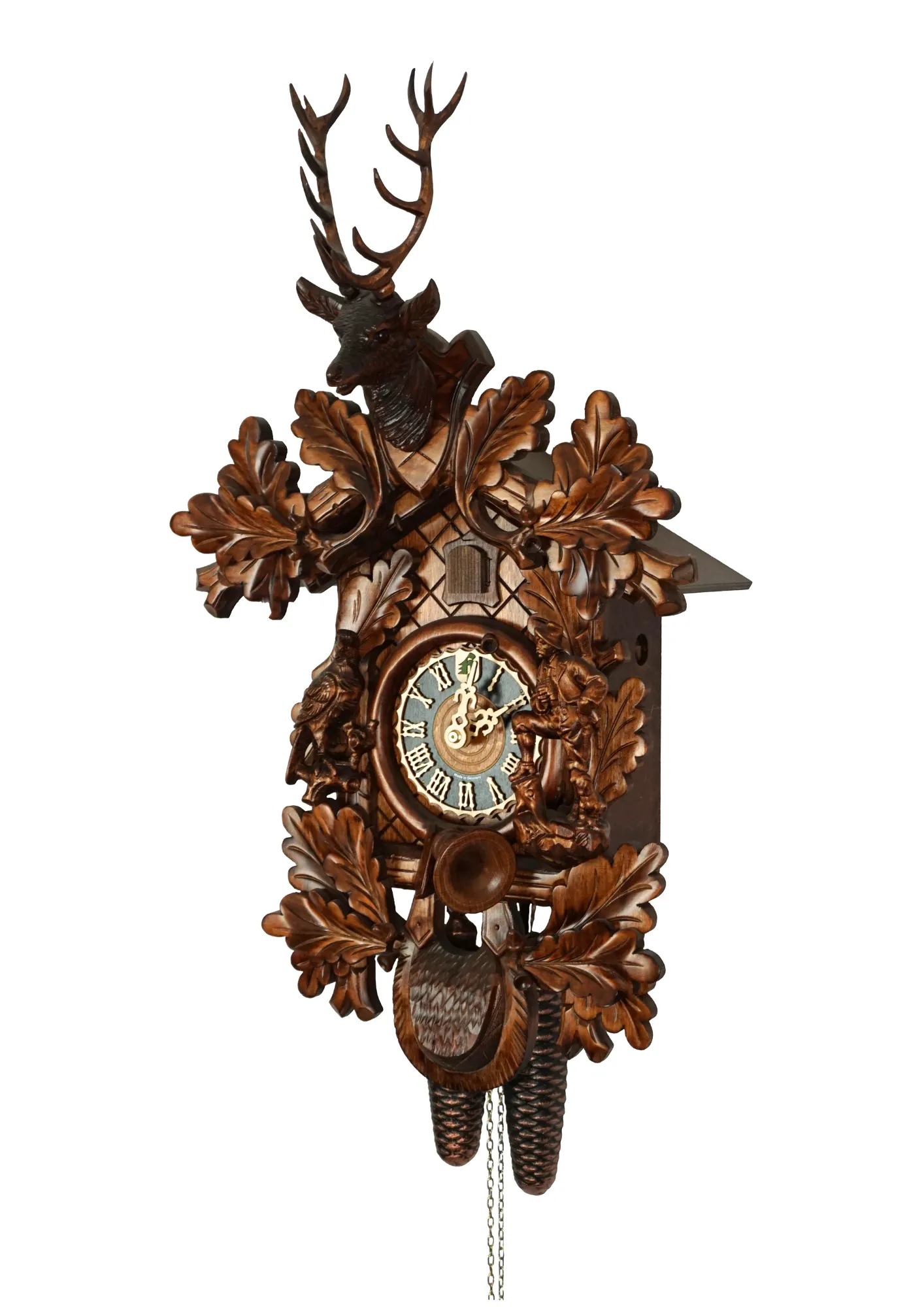 Cuckoo Clock  Hunter Clock  8 Day Movement (2) Hand carved authentic mechanical brown black forest cuckoo clock in a hunter theme. Precisely carved deer head is decorating the top while there is a hunter and a falcon figure on the sides of the clock. The clocks dial is wraped with a hunting horn while
